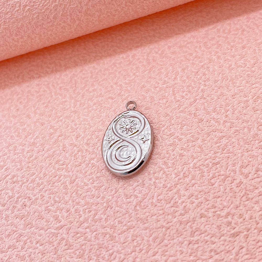 12009 Ouroboros with sun and moon charm