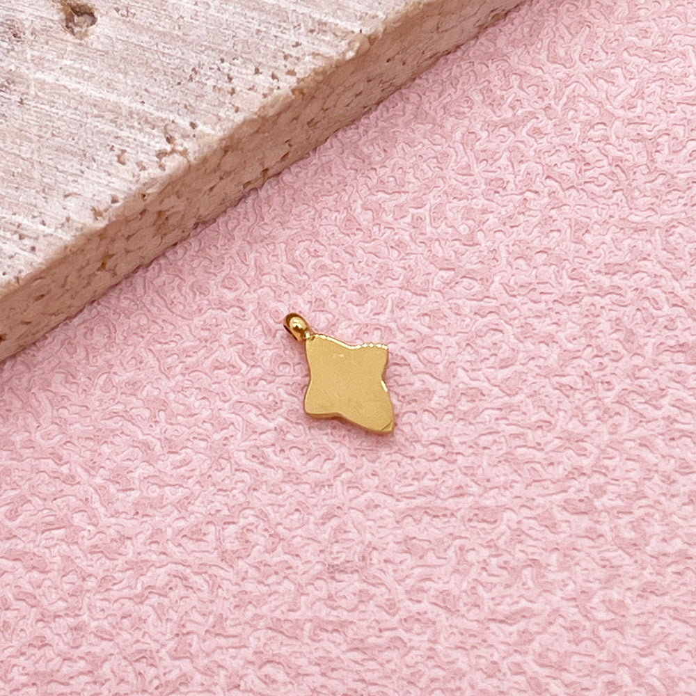 0560 Four pointed star charm