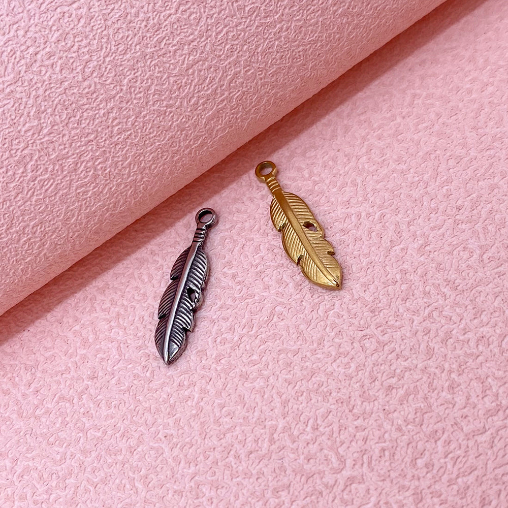 PC474 Feather charm