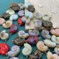 Shell ceramic charm
