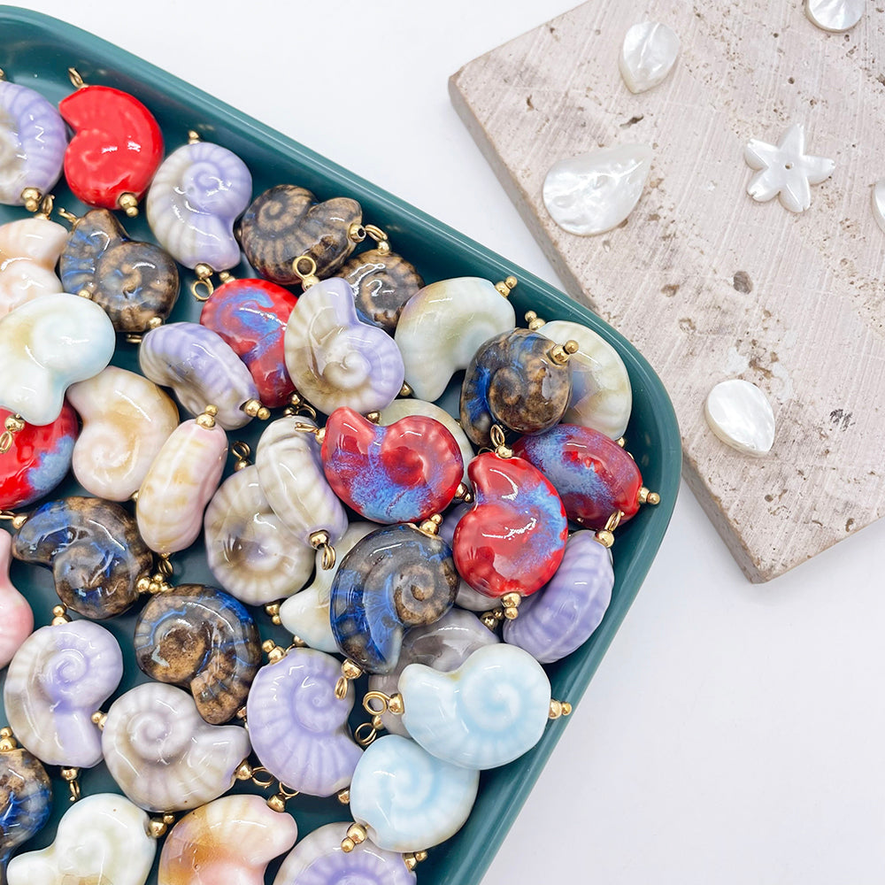 Shell ceramic charm