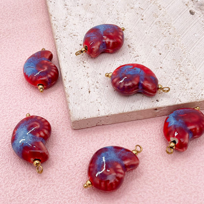 Shell ceramic charm