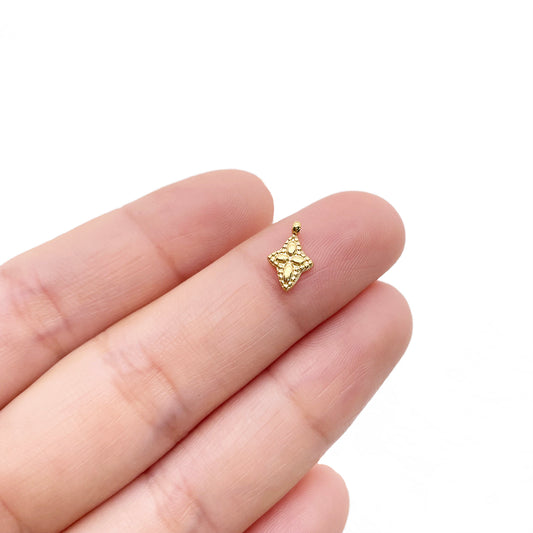 0560 Four pointed star charm